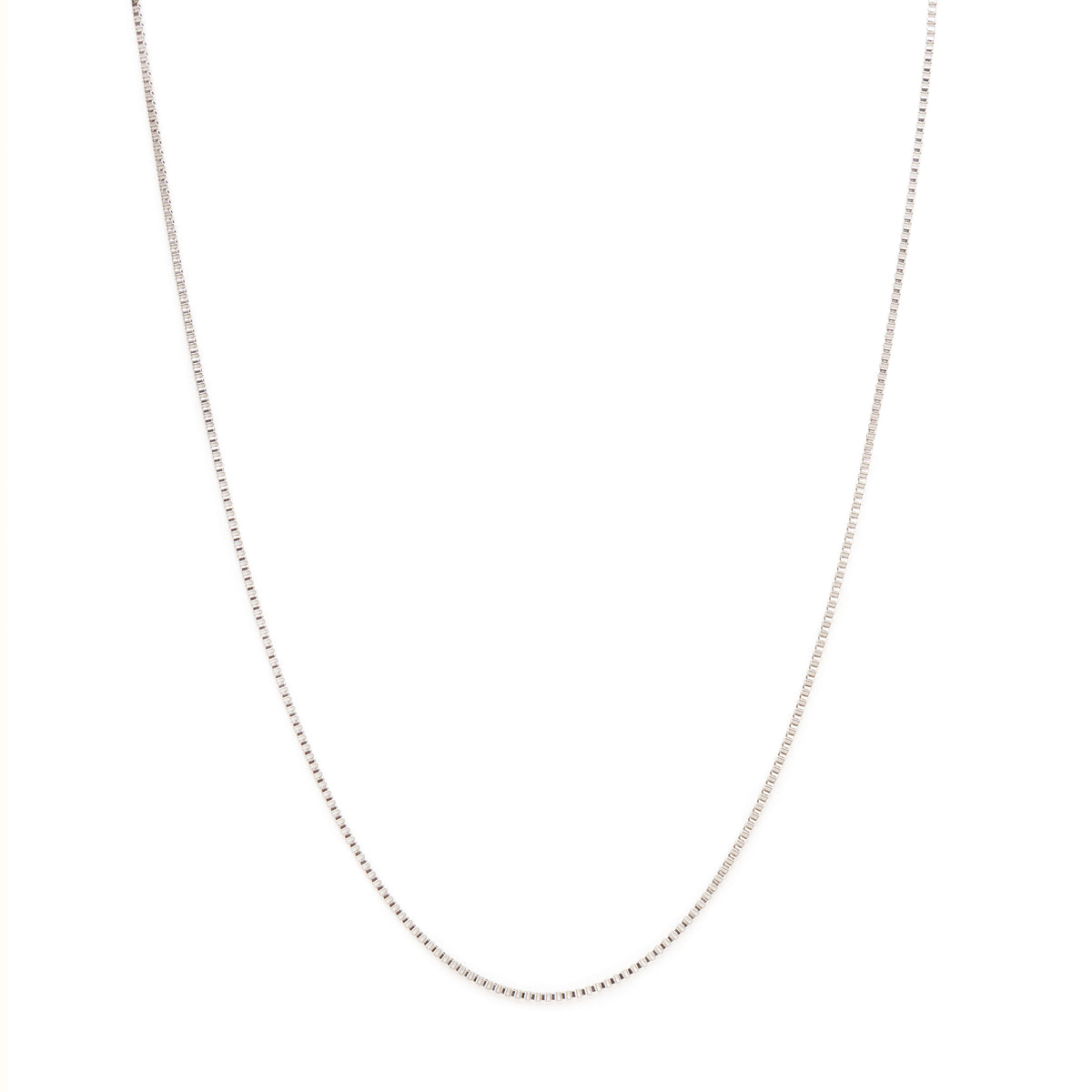 Kennett 2mm box chain necklace in silver tone, shown in a U-shape on a white background