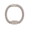 Kennett Meteorite Curb Chain Bracelet laid flat, 8.2mm brushed stainless steel curb chain with a rectangular meteorite inlay showing Widmanstätten patterns