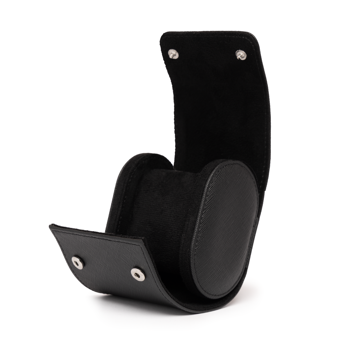 Kennett black Saffiano leather single watch roll open and empty, showing black microfibre suede lining and watch cushion with press-stud closure