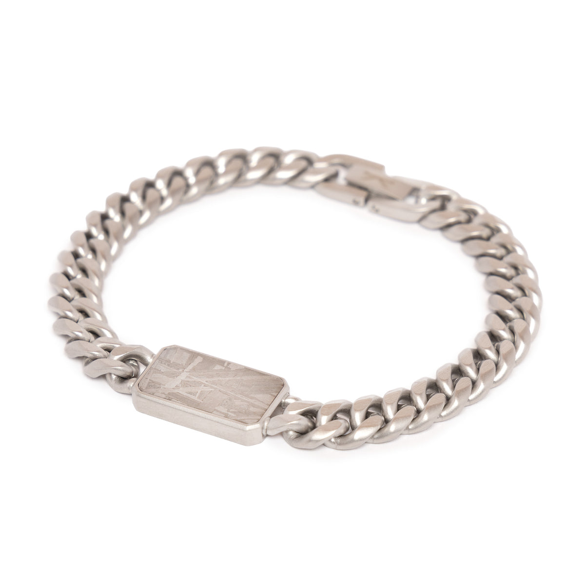 Kennett Meteorite Curb Chain Bracelet at an angle, showing the framed meteorite plate and brushed, sandblasted curb links
